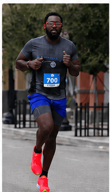 John Castor running a road race